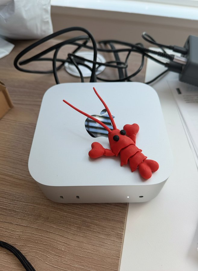 Clay lobster sitting on a Mac Mini